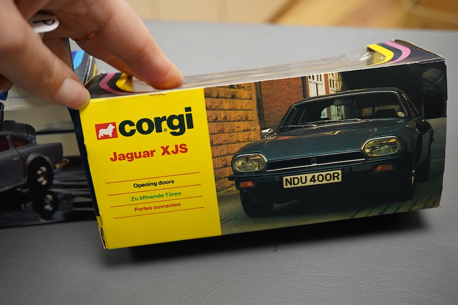 Two boxed 1970s Corgi Toys; a James Bond Aston Martin (261) in silver with passenger, together with a Jaguar XJS (319) in metallic red